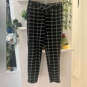 Chic Black Pants with White Grid Design